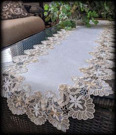 an image of a table cloth with lace on it