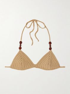 Magda Butrym's swimwear is made with the same attention to detail as the label's ready-to-wear collections. Hand-crocheted in Poland by master craftsmen, this bikini top has soft triangle cups and amber beads adorning the adjustable ties. Wear yours with the matching briefs. Luxury Triangle Top Swimwear, Luxury Summer Swimwear For Vacation, Beaded Triangle Top Swimwear For Pool, Beaded Swimwear With Triangle Top For Pool, Elegant Triangle Top Swimwear For Festivals, Luxury Fitted Beach Swimwear, Beaded Triangle Top Swimwear For Vacation, Fitted Beaded Triangle Top Swimwear, Beaded Triangle Top Swimwear For Summer