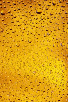 Premium Photo | Close up view of cold drops on the glass of beer background. texture of cooling alcohol drink with macro bubbles on the glass wall. fizzing or floating up to top of surface. golden colored. Alcohol Background, Beer Background, Camouflage Pattern Design, Glass Of Beer, Lemon Twist, Yellow Textures, Motion Graphics Design, Background Texture, Bubble Glass