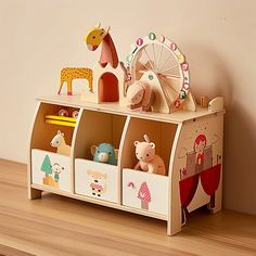 a wooden toy storage unit with toys on it