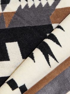 With over 150 years of heritage, Pendleton is renowned for its quality. The brand's woven blankets have been in production since 1863 and this towel is inspired by their original design. It’s made soft and absorbent cotton-terry jaquard-woven with the brand's bold 'Spider Rock' pattern. Rock Pattern, Tom Ford Bag, Woven Blankets, Luxury Sneakers, Snow Sports, Stylish Watches, Winter Gift, Woven Blanket, Saint Laurent Bag