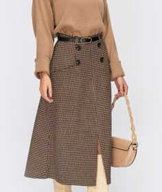 "Plaid jacquard midi-length skirt. Model with pockets, decorative buttons and front slit. Fastens with a hidden zipper. Fabric: 35% wool, 35% viscose, 30% polyester Skirts length 77 cm chest waist hip XS: 84cm 64cm 88cm (33\") (25\") (34.6\") S: 88cm 68cm 92cm (34.6\") (26.7\") (36.2\") M: 92cm 72cm 96cm (36.2\") (28.3\") (37.8\") L: 96cm 76cm 100cm (37.8\") (29.9\") (39.4\") XL: 100cm 80cm 104cm (39.4\") (31.5\") (40.9\") 2XL: 104cm 84cm 108cm (40.9\") (33.1\") (42.5\") 3XL: 108cm 88cm 112cm (4 Elegant Long Skirt Outfits, Brown Wool Skirt Outfit, Cozy Skirt, Warm Skirt, Warm Skirts, Office Clothing, Long Plaid Skirt, Maxi Skirts Summer, Below The Knee Skirt