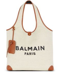 light beige/camel brown/calf leather cotton blend contrasting border embroidered logo to the front two top handles magnetic fastening main compartment debossed internal logo removable card slot Balmain Bag, Grocery Tote Bag, Bold Logo, Balmain Paris, Grocery Tote, Pierre Balmain, Bags Logo, Embroidered Bag, Brown Canvas