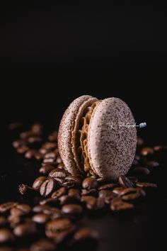 an image of some food that is on top of coffee beans and it looks like something out of space