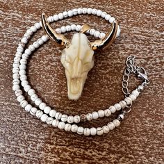 Statement Piece! This Bull Skull Necklace Turns Heads With Its Gold Plated Horns. Wear It Alone Or Layered With Other Necklaces. Great Piece For The Nfr And Also A Great Gift! White Bohemian Skull Jewelry, Bull Skull, Bull Skulls, Skull Necklace, Cow Skull, Jewelry Statement, Shop Jewelry, Red Gold, Womens Jewelry Necklace