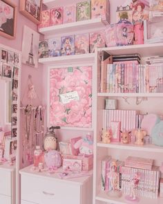 a room filled with lots of pink items and pictures on the wall next to bookshelves