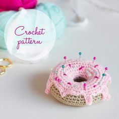 a crochet donut sitting on top of a table