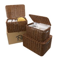 two wicker storage baskets with lids and liners, one is open and the other is closed