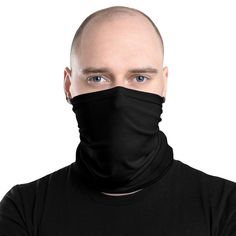 a man wearing a black neck gaiter