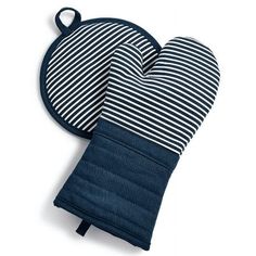 two oven mitts with black and white stripes on the front, one has a heart shaped