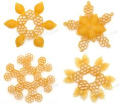 four different types of brooches are shown in this image, one is yellow and the other is orange