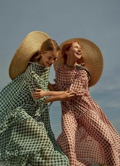 two women in dresses and straw hats are dancing on an instagramtion page with the caption'marieclaisu '