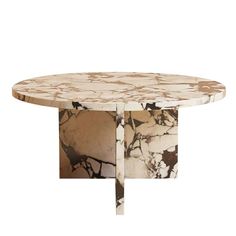 a round marble table with an abstract design