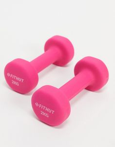 two pink dumbbells sitting next to each other on a white surface with the words fitnut 2kg