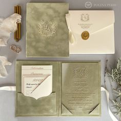 the wedding stationery is laid out on top of each other and ready to be put in