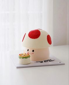 there is a mushroom cake on the table