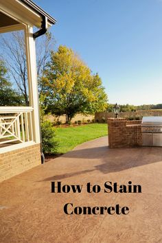 an outdoor kitchen and grill area with the words how to stain concrete