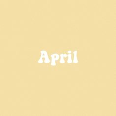 an image of the word april written in white on a pale yellow background with small dots