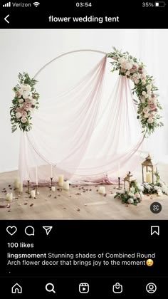 the wedding arch is decorated with flowers and candles