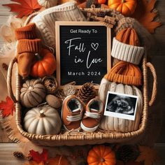 a basket filled with fall items and a sign that says, get ready to fall in love