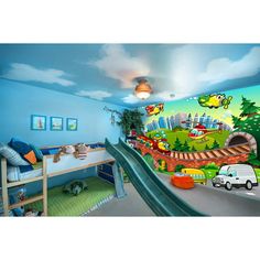 a child's bedroom decorated in blue and green with a train mural on the wall