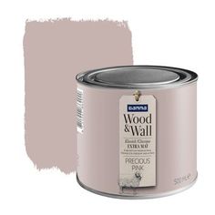 a pink paint can with the words'wood & wall'on it and a white background