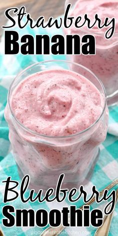 strawberry banana blueberry smoothie in a small glass bowl with strawberries on the side