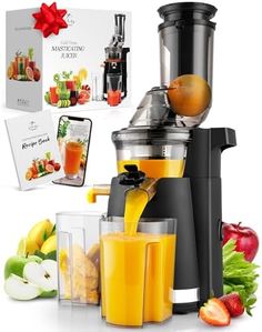 the juicer is full of fresh fruit and vegetables