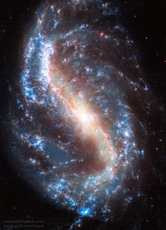 an image of a spiral galaxy in the night sky