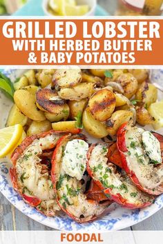 grilled lobster with herbed butter and baby potatoes on a blue and white plate