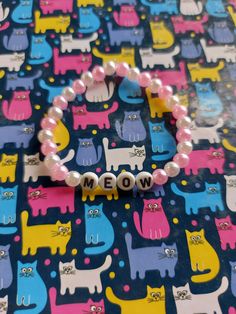 bracelet beads meow cat colorful cute white pearl pink rose Accessories Pink, Pearl Pink, Phone Strap, White Pearl, Pink Rose, Pearl White, Pink White, Abc, Beaded Necklace