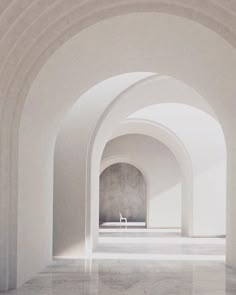 an empty room with white walls and arches on the floor, leading to a bench