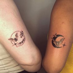 two people with matching tattoos on their arms