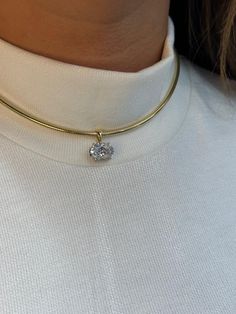 Add a touch of luxury to your look with this stunning Oval CVD Diamond Choker. Featuring a beautifully cut oval lab-grown diamond (CVD), this choker is both eco-friendly and dazzling. The sparkling CVD diamond is set in a sleek and minimalistic design, making it a perfect statement piece for any occasion. Crafted from high-quality materials, this elegant choker sits comfortably around the neck and adds an aura of sophistication to any outfit. Whether you're dressing up for a formal event or look Oval Diamond Necklace, Diamond Necklace Choker, Elegant Diamond Necklace, Messy Life, Elegant Choker, Cvd Diamond, Diamond Choker, Jewelry Lookbook, Minimalistic Design