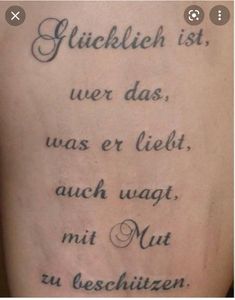 the back of a person's leg with a tattoo on it that reads gluck