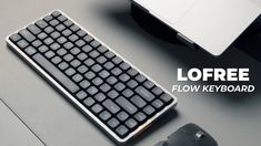 a computer keyboard sitting on top of a desk next to a mouse and keyboard pad