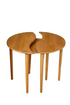 two wooden tables sitting on top of each other