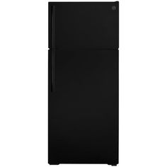 a black refrigerator freezer sitting on top of a white wall