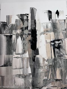 an abstract painting with black and white colors