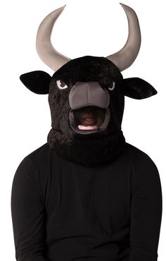 a man in a black shirt wearing a bull mask