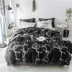 black and white bedding in a bedroom