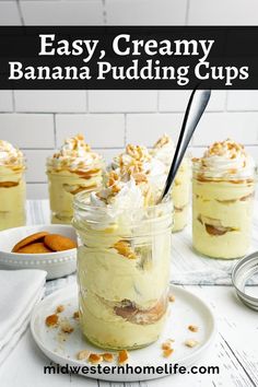 banana pudding in a mason jar with whipped cream and toasted almonds on top