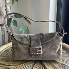 Authentic Fendi Baguette. Militare Suede Material. In A Very Good Vintage Condition. So Stains Or Rips. Inside Is Clean. 10” Length. 6.5” Height. Dm Me For More Photos And Questions. No Return Or Exchange Final Sale Suede Material, Fendi Baguette, Fendi Bags, Dm Me, More Photos, Final Sale, Fendi, Bag Lady, Shoulder Bag