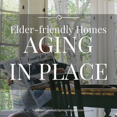 a man sitting at a table reading a newspaper with the words elder - friendly homes aging in place