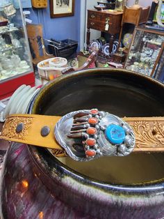 This is a wonderful Navajo sterling silver belt and buckle with turquoise, coral and bear claw decoration. It is signed on the back and i have a picture of it. I do not think the belt has ever been used. It has a length of 40 inches from tip to end of buckle. The belt itself snaps on the buckle and can be replaced. It is all there and great condition. Navajo Belt, Bear Claw, Bear Claws, Silver Belt, Silver Belts, Suspender Belt, Belt Buckle, Belt Buckles, Coral