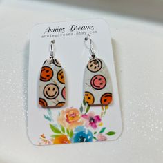 These cute smiley face earrings are made of leather backed cork. They measure 1 inch in length. Smiley Face Earrings, Cute Smiley Face, Spring Earrings, Mini Earrings, Earrings Summer, Face Earrings, Summer Earrings, Summer Earring, Smiley Face