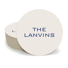 two white coasters with the words the lanvins printed on them and stacked up next to each other