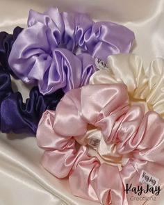 When you purchase any three satin scrunchies, we'll add a fourth one to your order completely FREE! The color of your free scrunchie will be a delightful surprise, selected randomly from our beautiful assortment. Material * 100% Charmeuse (poly-satin) * Handmade in the USA Size * Standard 4 inch  diameter  Wraps around hair 2-3x depending on hair thickness. Satin Scrunchies, Thick Curly Hair, Tie Gifts, Hair Breakage, Blue Bonnets, Women's Hair, Build Your Own, Hair Looks, Hair Ties