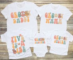 three white onesuits with the words grooy buddy and giraffe sister on them