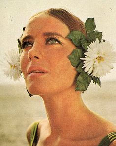 a woman with flowers in her hair